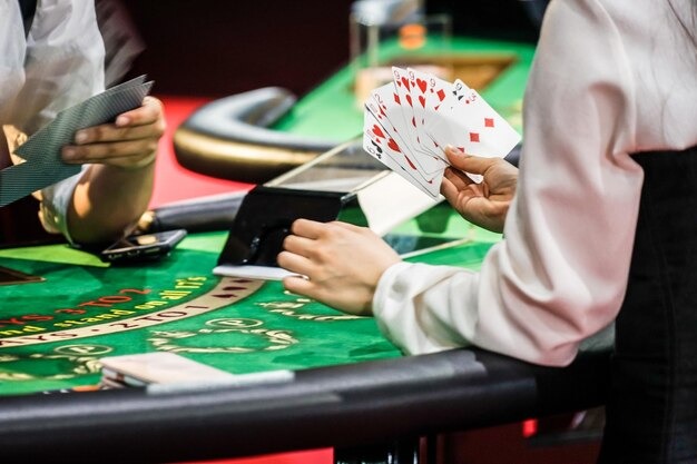 Live dealer dealing cards at Sakong table